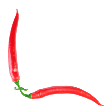 Red hot chili peppers isolated on white backgroundの写真素材