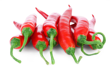 Red hot chili peppers isolated on white backgroundの写真素材