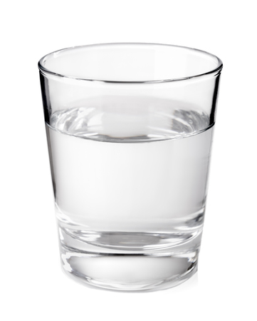 Transparent glass with clean mineral water isolated on white background Transparent glass with clean mineral water isolated on white background