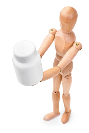 Wooden man hold a medical containerの写真素材