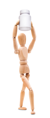 Wooden man hold a medical containerの写真素材