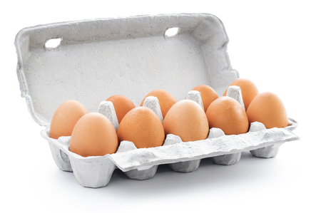 Ten brown eggs in a carton packageの写真素材