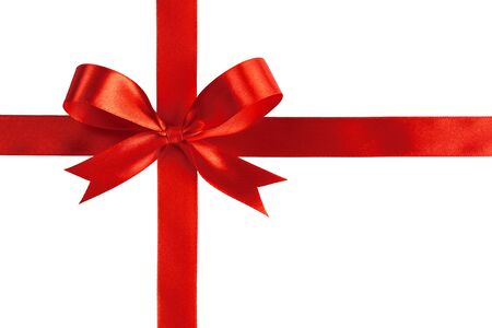 Gift silk bow of red ribbon isolated on white backgroundの写真素材