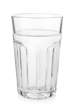 Transparent glass with clean mineral water isolated on white backgroundの写真素材