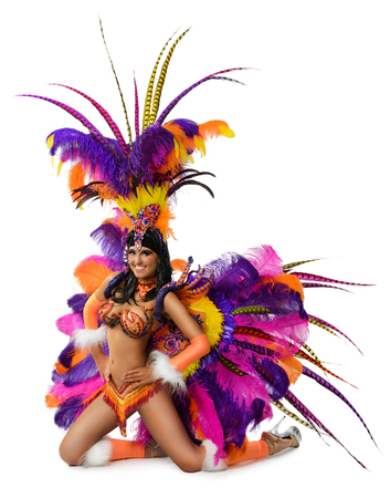 Smiling beautiful girl in a colorful carnival costumeの写真素材