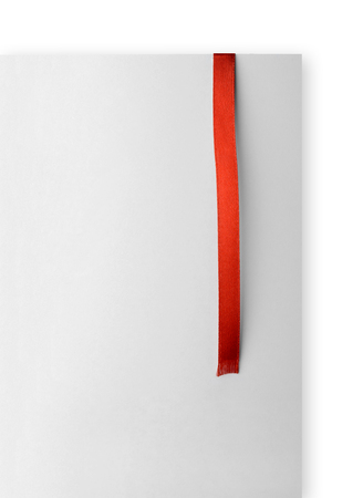 Red bookmark on empty sheet of paperの写真素材