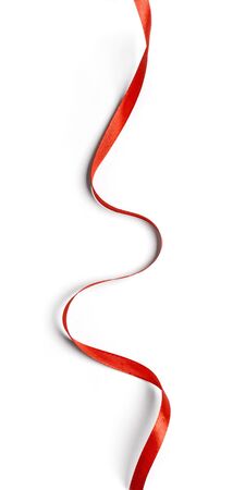 Curly red ribbon isolated on white backgroundの写真素材