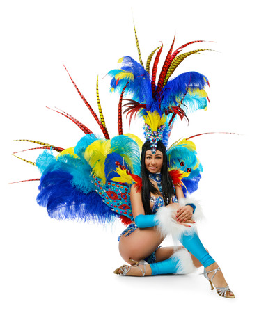 Smiling beautiful girl in a colorful carnival costumeの写真素材
