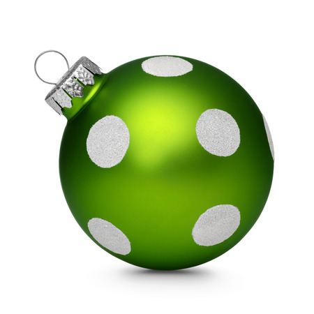 Green christmas ball with spots isolated on white backgroundの写真素材