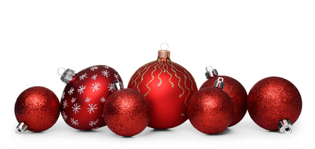 Group of red christmas balls isolated on white backgroundの写真素材