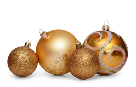 Group of gold christmas balls isolated on white backgroundの写真素材