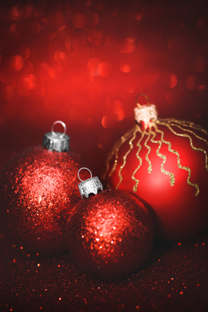Group of christmas balls on red background close-upの写真素材