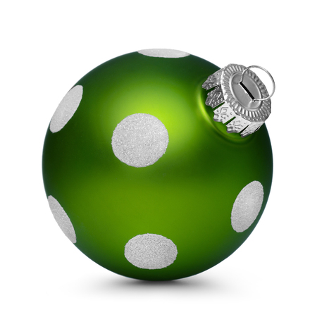 Green christmas ball with spots isolated on white backgroundの写真素材