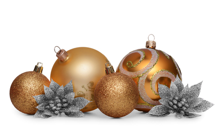 Group of gold christmas balls isolated on white backgroundの写真素材