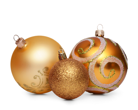 Group of gold christmas balls isolated on white backgroundの写真素材