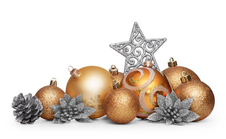 Group of gold christmas balls isolated on white backgroundの写真素材