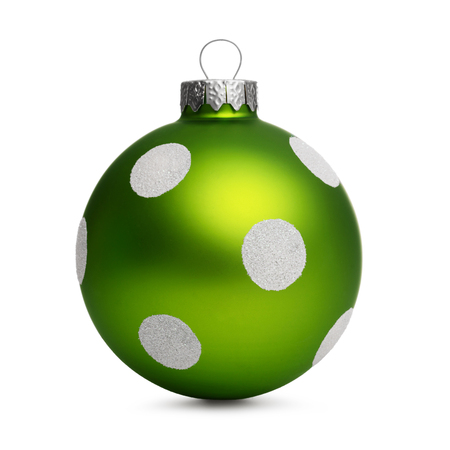 Green christmas ball with spots isolated on white backgroundの写真素材