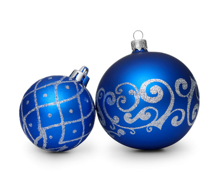 Two blue christmas balls isolated on white backgroundの写真素材