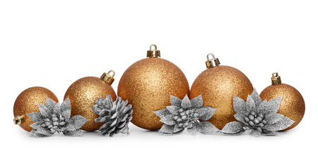 Group of gold christmas balls isolated on white backgroundの写真素材