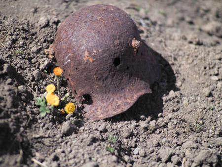 Wehrmacht rusty helmet with bullet holes. WWIIのeditorial素材