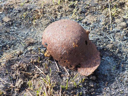 Wehrmacht rusty helmet with bullet holes. WWIIのeditorial素材