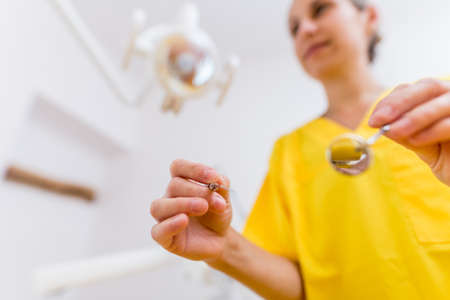 Medical equipment and stomatology concept, yellow dentistry