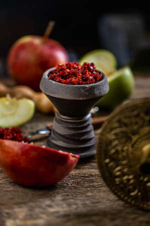 Arabian stone hookah head filled with apple and pomegranade flavoured tobacco