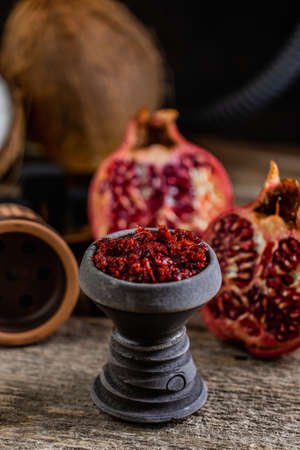 Arabian stone hookah head filled with pomegranade flavoured tobaccoの写真素材