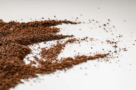 Roasted coffee ground on isolated white backgroundの写真素材