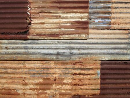 Wall of corrugated iron sheet in a poor district of Inhambane, Mozambique, Africaの写真素材