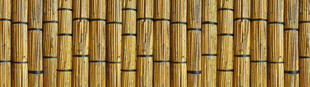Wall made of reed mats, Africa backgroundの写真素材