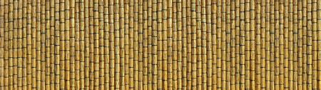 Wall made of reed mats, Africa backgroundの写真素材