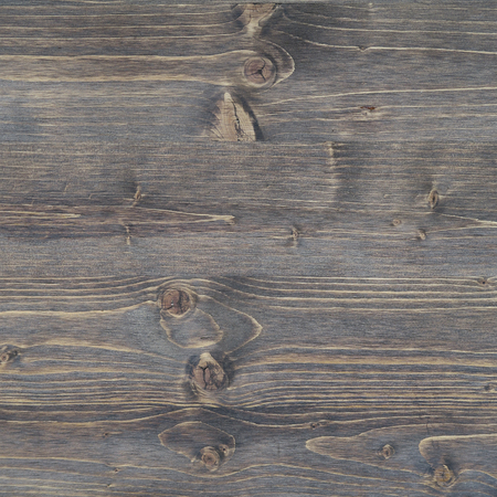 Weathered, rustic wood texture with knotholesの写真素材