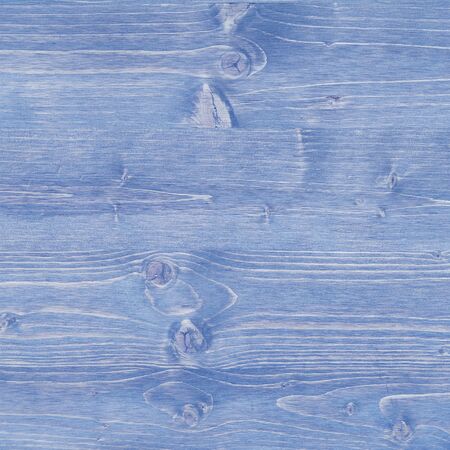 Blue, rustic wood texture with knotholesの写真素材