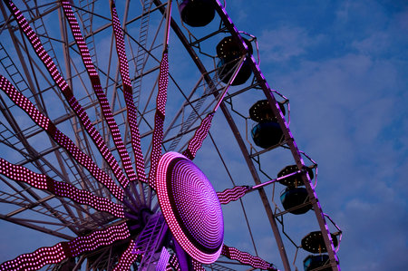 Nuremberg Folk Festival 2022 at night: Very impressive light shows of the rides at night are created when they are exposed for a longer time. A very special atmosphere...の写真素材