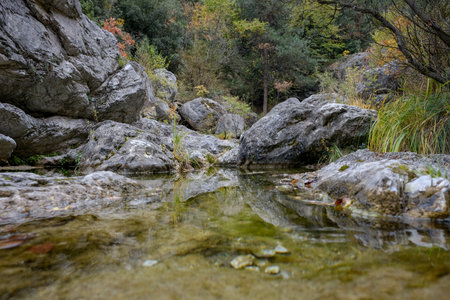 Autumn landscape with river and rocks in the forest, Whether sea, lake or river, water is one of the most beautiful elements of nature.の写真素材