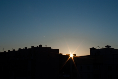 Roof and sunsetの写真素材
