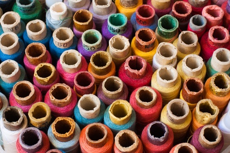 Colorful reels of threads background - A series of TAILOR related images 