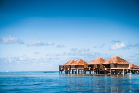 Over water bungalows with steps into amazing green lagoonのeditorial素材
