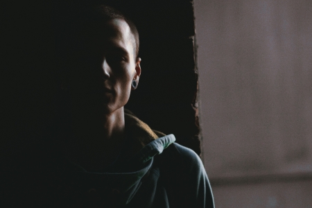 Portrait of a male model in the darkの写真素材