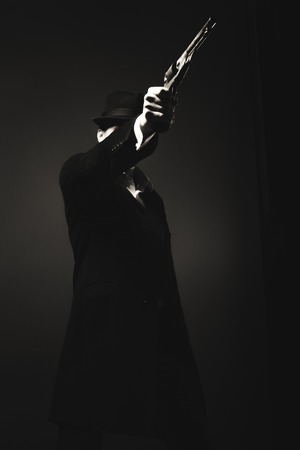 Midnight gangster in vintage look. Midnight killerの写真素材