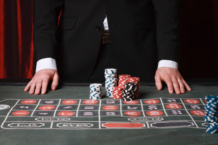 man playing at the casino. studio shot
