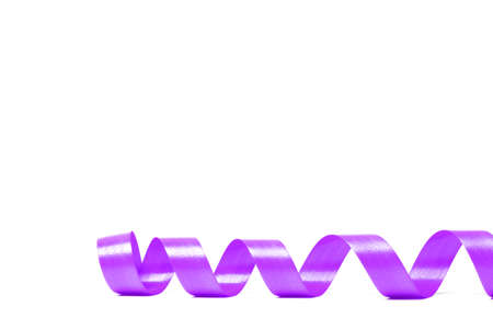 violet satin ribbon on white background. studio shotの写真素材