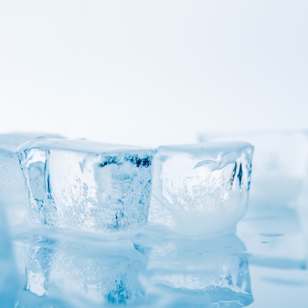 Ice cubes on a white background. studio shotの写真素材