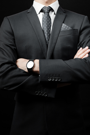 man in tie on a black background. studio shotの写真素材