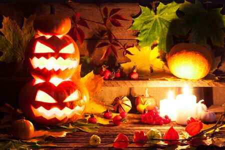 Halloween pumpkin head on wooden background. Studio shotの写真素材