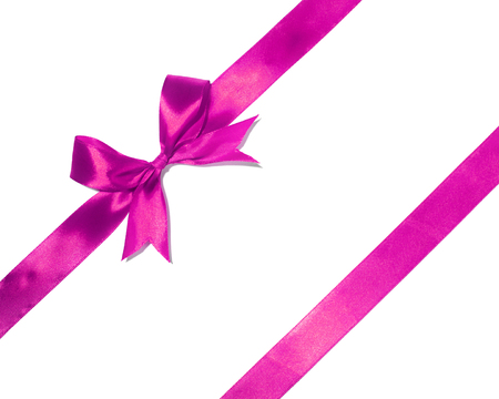 Purple  ribbon and bow isolated on white backgroundの写真素材