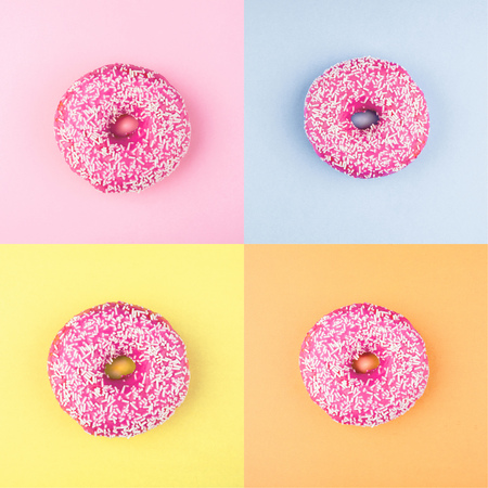 Four sweet doughnuts on color background. Fashion minimalの写真素材