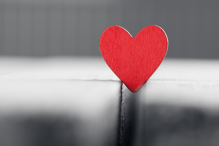 Valentine background with handmade heart on rustic woodの写真素材