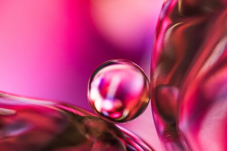 Small glass ball in abstract macro compositionの写真素材